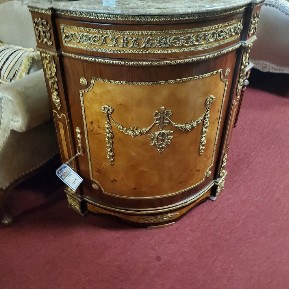 Corner antique chest with brass finishings
